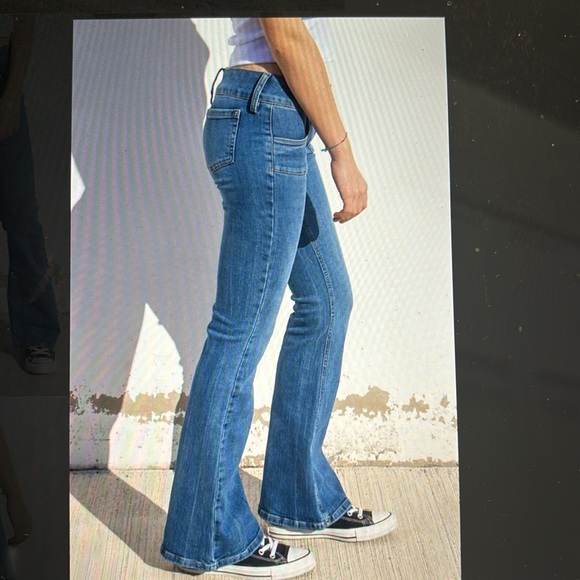 Subdued Low Waist Flare Jean With Front Square Pockets - Picture 5 of 13